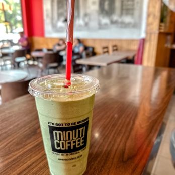 Minuti Coffee - a green smoothie with a red straw - Coffee & Tea Near Me - Houston, Texas Minuti Coffee - a green smoothie with a red straw - Coffee & Tea Near Me - Houston, Texas