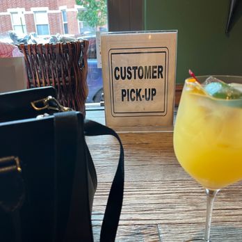 Delta's - Near entrance - with my peach sangria - Soul Food Near Me - New Brunswick, New Jersey