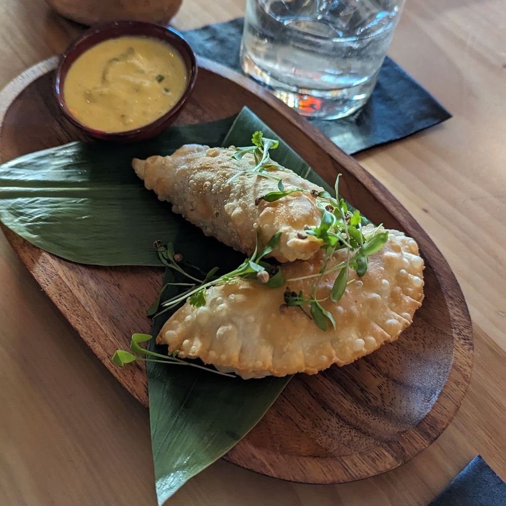 Pisco Peruvian Gastrobar - Empanadas de Lomo Saltado - Peruvian Near Me - Orlando, Florida Pisco Peruvian Gastrobar - Empanadas de Lomo Saltado - Peruvian Near Me - Orlando, Florida