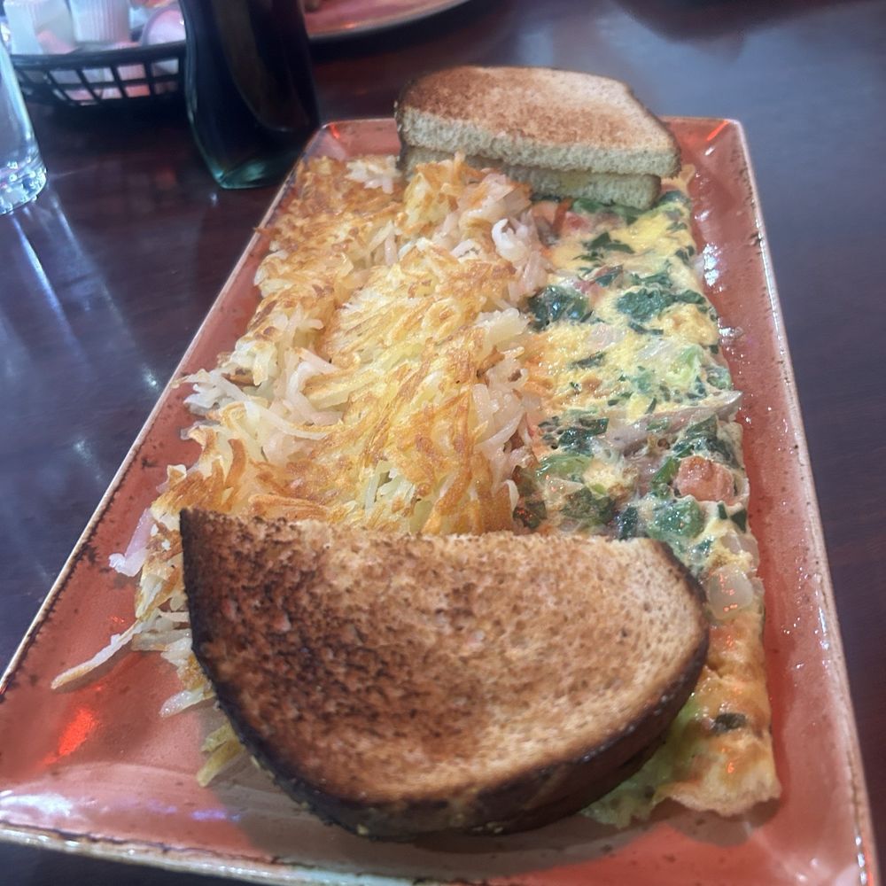 Brunch Cafe - Country Omelette was awesome got the sausage gravy on the side for my hash browns. - American Near Me - Livonia, Michigan Brunch Cafe - Country Omelette was awesome got the sausage gravy on the side for my hash browns. - American Near Me - Livonia, Michigan