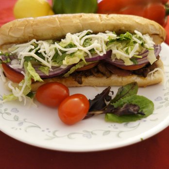 Melting Pot Grill - Steak Sandwich: Beef, lettuce, tomato, onion, and tzatziki sauce. - Food Trucks Near Me - Oakland, California Melting Pot Grill - Steak Sandwich: Beef, lettuce, tomato, onion, and tzatziki sauce. - Food Trucks Near Me - Oakland, California