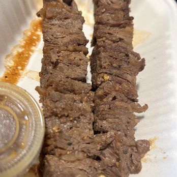 WagyuKushi - Very tender thin slices of skewered beef... wasabi shoyu sauce adds another layer of flavor so don't be afraid to try it! - Japanese Near Me - Honolulu, Hawaii WagyuKushi - Very tender thin slices of skewered beef... wasabi shoyu sauce adds another layer of flavor so don't be afraid to try it! - Japanese Near Me - Honolulu, Hawaii