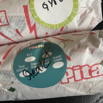 Pita Pit - two wrapped sandwiches on a table - Sandwiches Near Me - Anchorage, Alaska