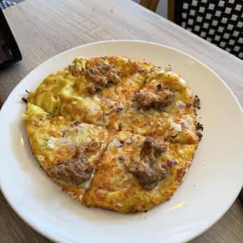 INTL Kitchen - yellow curry roti pizza with sausage - Asian Fusion Near Me - Milpitas, California