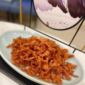Manchu Mansion - a plate of crisped onion flakes - Chinese Near Me - Markham, Ontario Manchu Mansion - a plate of crisped onion flakes - Chinese Near Me - Markham, Ontario