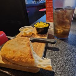 Boom City Restaurant & Pub - Warm bread served with honey butter and sliced pepperoncini