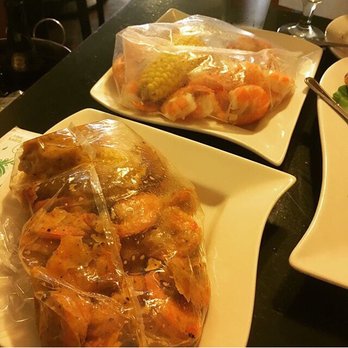Bistro SouthEast - All the seafood (bibs provided at your request) - Asian Fusion Near Me - Philadelphia, Pennsylvania