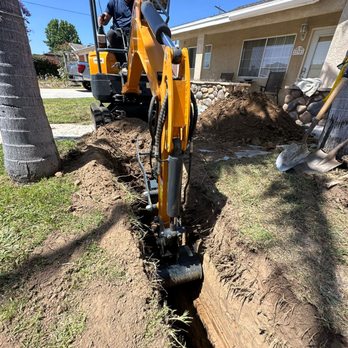 ValueMax Rentals - VM18 1.8 Ton Kubota powered Excavator in action. Digging a trench - Machine & Tool Rental Near Me - Los Angeles, California ValueMax Rentals - VM18 1.8 Ton Kubota powered Excavator in action. Digging a trench - Machine & Tool Rental Near Me - Los Angeles, California