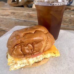 Breakfast sandwich, black iced tea