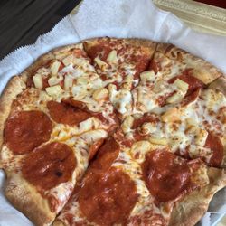 Angaleno's Pizza - Pepperoni with pineapple and extra cheese on one half