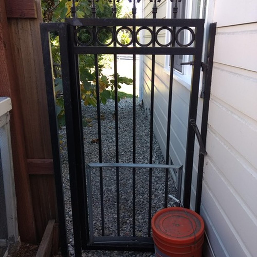 Before shot. Fence was in bad shape with misaligned post. Before shot. Fence was in bad shape with misaligned post.
