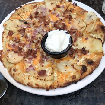 Laughing Buddha - P.E.I pizza - Pubs Near Me - Sudbury, Ontario