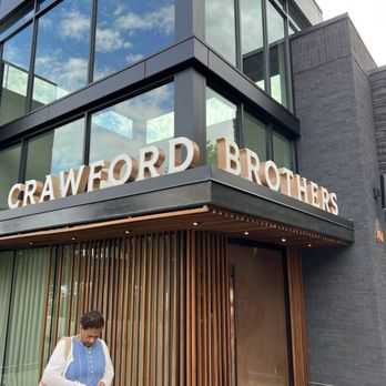 Crawford Brothers Steakhouse - Crawford Brothers entrance- the front door is about 7feet high and about 6 feet wide- grand entrance - Steakhouses Near Me - Cary, North Carolina