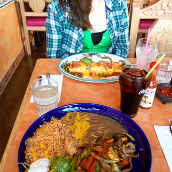 Mazatlan Mexican Restaurant - front plate, combo fajitas. back plate, deluxe burrito Manadero - Mexican Near Me - Everett, Washington