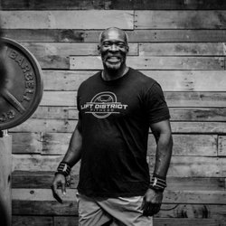 Lift District Fitness - Coach Nathan getting ready to squat!