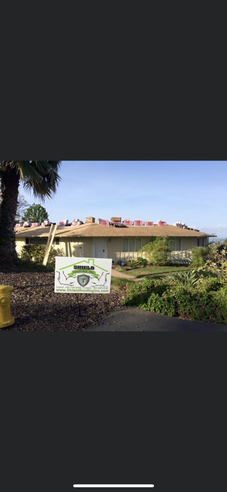 Slide of Shield Roofing