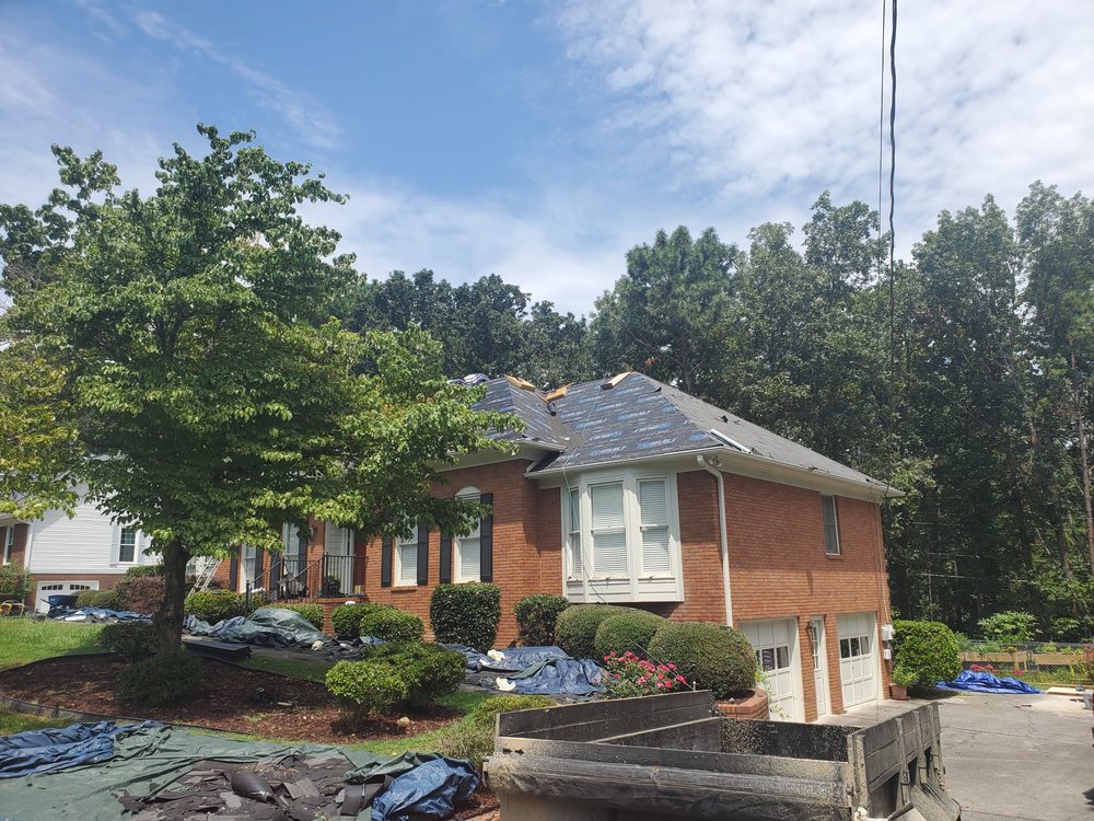 Slide of Brewer Roofing & Construction