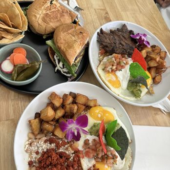 Virgil Cafe - Chilaquiles rojos with chorizo, CHILAQUILES with green sauce, and a torta - Breakfast & Brunch Near Me - Los Angeles, California Virgil Cafe - Chilaquiles rojos with chorizo, CHILAQUILES with green sauce, and a torta - Breakfast & Brunch Near Me - Los Angeles, California