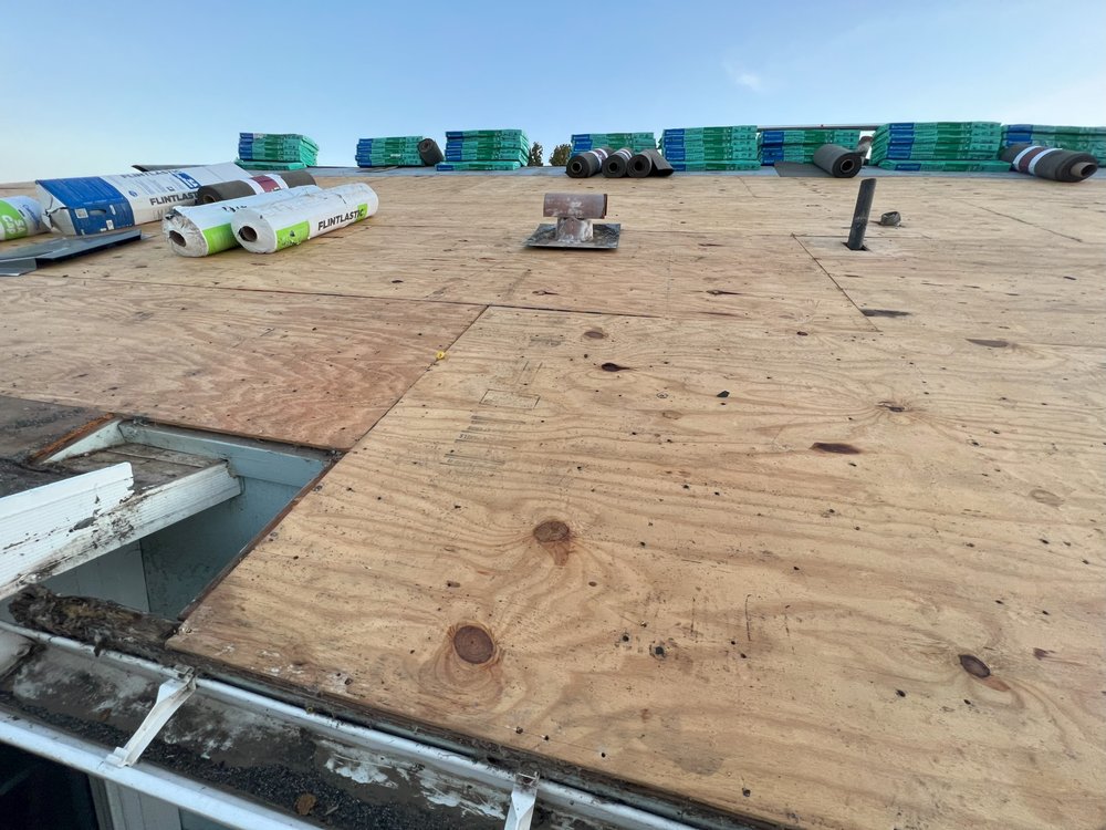 Slide of El Puma Roofing