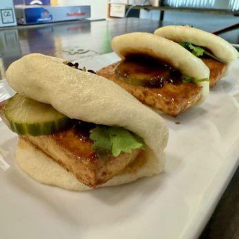 Kojin Noodle Bar - Steamed Tofu Buns (with pickled cucumbers) - Noodles Near Me - Key West, Florida Kojin Noodle Bar - Steamed Tofu Buns (with pickled cucumbers) - Noodles Near Me - Key West, Florida