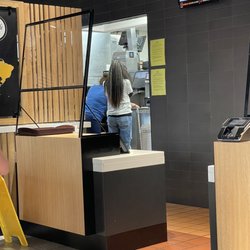 McDonald's - Girl going back to the kitchen while out with a group of friends