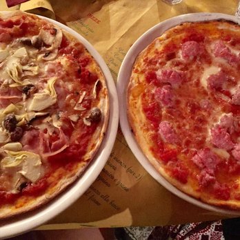 Rusticanella 2 - Ham/Artichokes/Olives/Mushroom pizza and sausage/cheese/tomato pizza - Pizza Near Me - Lucca, LU Rusticanella 2 - Ham/Artichokes/Olives/Mushroom pizza and sausage/cheese/tomato pizza - Pizza Near Me - Lucca, LU