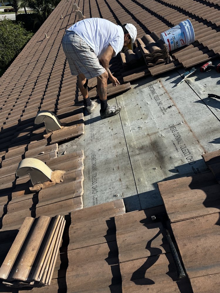 Slide of Tropical Roofing Services