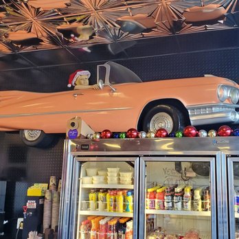Cella Bagels - a car on top of a refrigerator - Bagels Near Me - Selden, New York