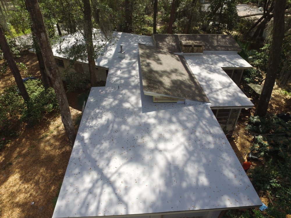 Slide of TMT Roofing