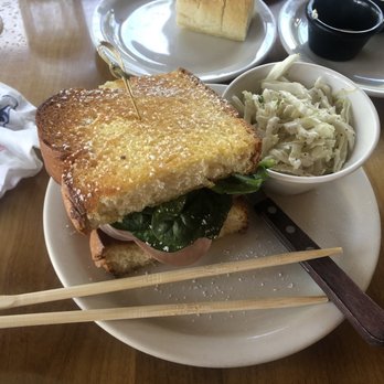Buzz's - Ham and cheese sandwich on Portuguese sweet Brest dusted with powdered sugar - Steakhouses Near Me - Kailua, Hawaii Buzz's - Ham and cheese sandwich on Portuguese sweet Brest dusted with powdered sugar - Steakhouses Near Me - Kailua, Hawaii