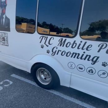 TLC Mobile Pet Grooming - Side of grooming bus - Pet Groomers Near Me