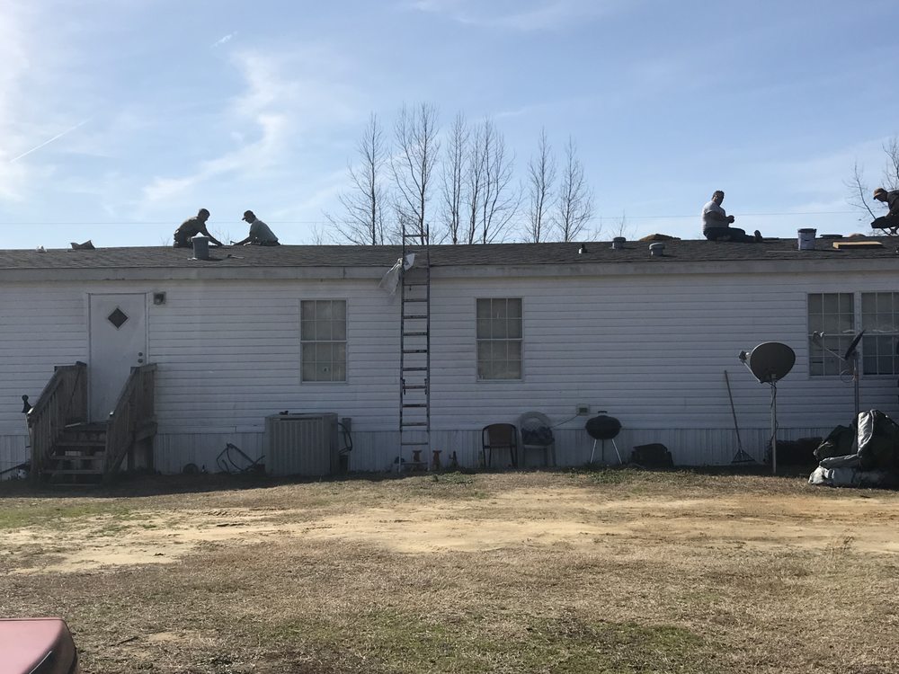 Slide of Butler Roofing