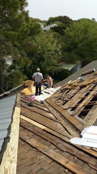 Slide of Port City Roofing