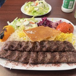 This is the koobideh kabob with rice and that delicious piece of tahdig, and salad. This is the koobideh kabob with rice and that delicious piece of tahdig, and salad.