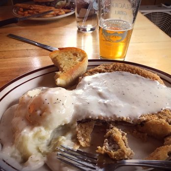 Glacier Ridge Bar, Grill, and General Store - a plate of fried chicken with gravy and mashed potatoes - Breakfast & Brunch Near Me - Joseph, Oregon Glacier Ridge Bar, Grill, and General Store - a plate of fried chicken with gravy and mashed potatoes - Breakfast & Brunch Near Me - Joseph, Oregon