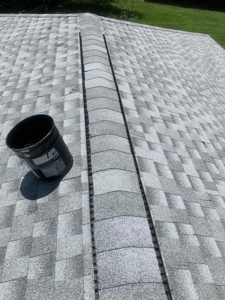 Slide of Big Orange Roofing