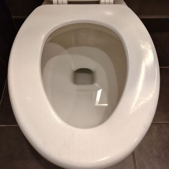 Hotel Novotel Toronto North York - The old toilet seat with coating peeled off in parts which shows it's overdue for an upgrade - Hotels Near Me - Toronto, Ontario Hotel Novotel Toronto North York - The old toilet seat with coating peeled off in parts which shows it's overdue for an upgrade - Hotels Near Me - Toronto, Ontario