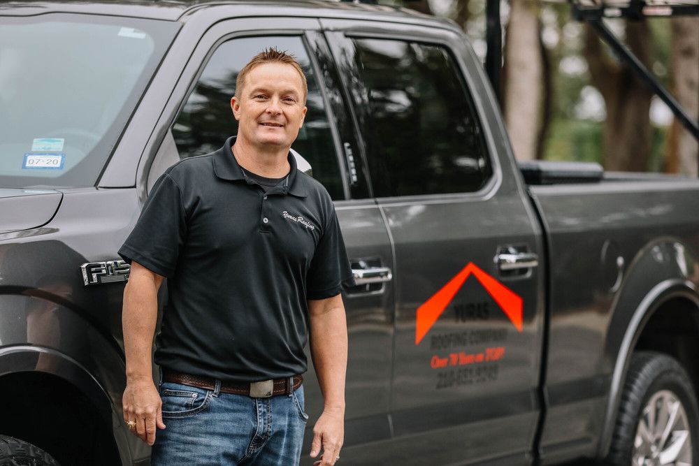 Slide of Yuras Roofing