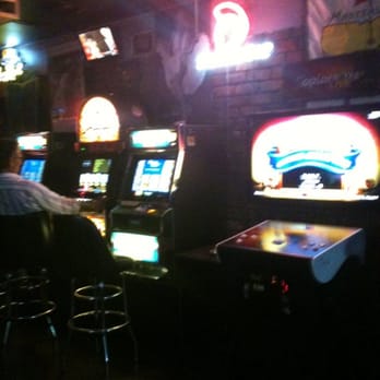 Red Door - Three gambling machines and a golf game - Lounges Near Me - New Orleans, Louisiana