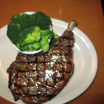 Texas Roadhouse - 20 oz bone in Rib Eye (rare) cooked to perfection (in our opinion) - Steakhouses Near Me - Winchester, Virginia