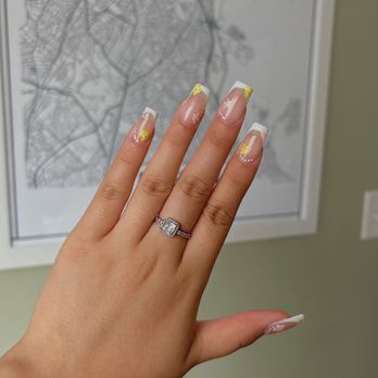 Fancy Nails - manicure medium white french tip with floral nail art - Nail Salons Near Me - Lowell, Massachusetts