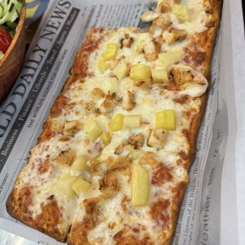 DinoLand Cafe - Pinosaur Hawaiian flatbread - New American Near Me - Myrtle Beach, South Carolina