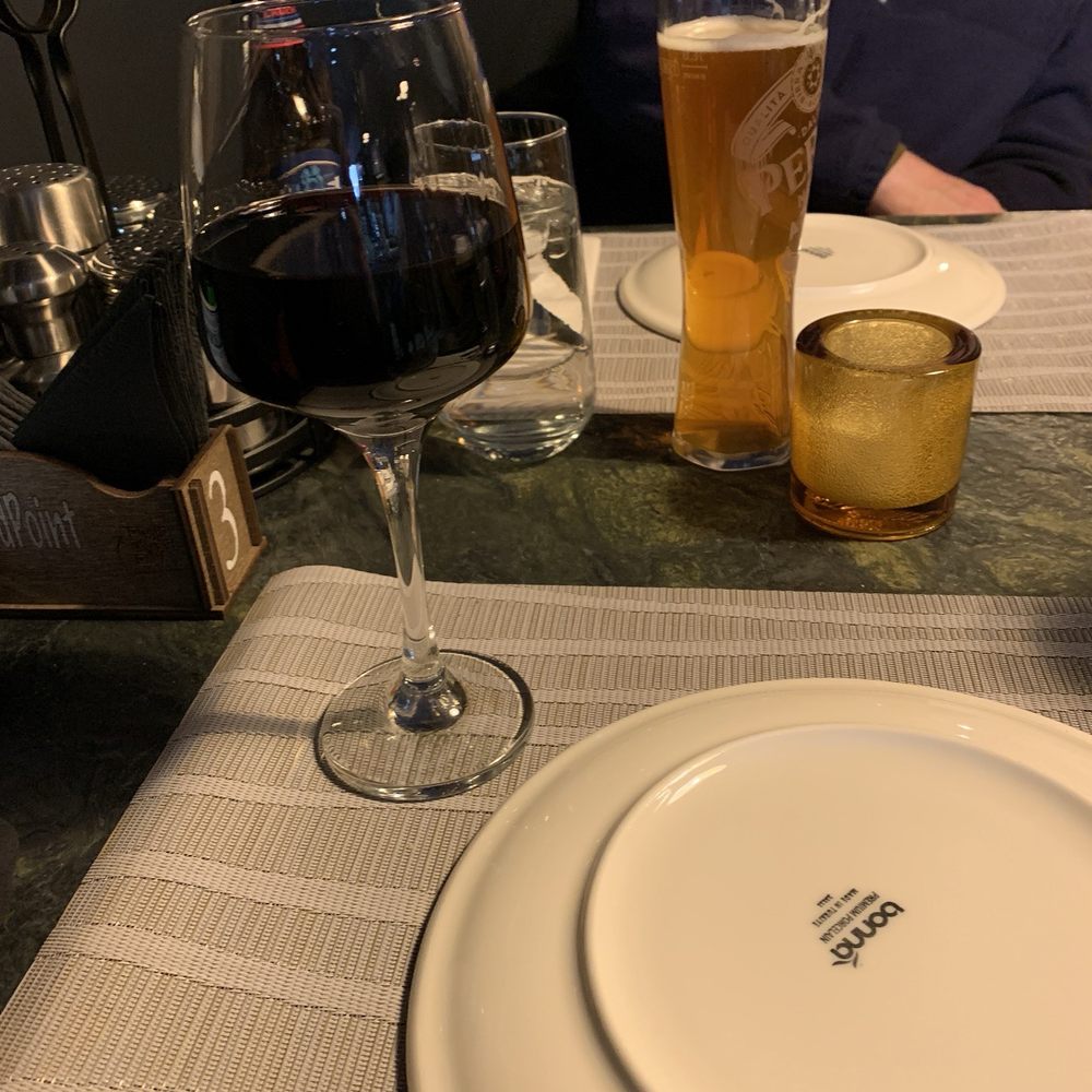 two glasses of wine and a plate two glasses of wine and a plate
