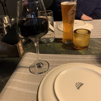 MidPoint Wine Bar & Restaurant - two glasses of wine and a plate - Pizza Near Me - Latham, New York MidPoint Wine Bar & Restaurant - two glasses of wine and a plate - Pizza Near Me - Latham, New York