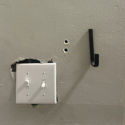Joe Schmo Electrical Services - Both hooks were to be removed and switch in their place, as close to edge as possible