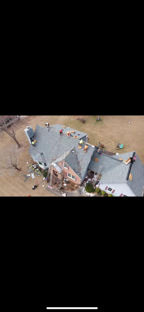 Slide of Capstone Roofing