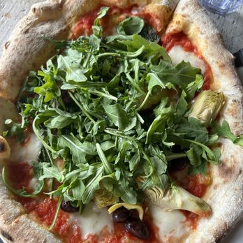 Buona Forchetta - Puttanesca Pizza with artichokes and arugula to replace anchovies and capers. - Pizza Near Me - Encinitas, California
