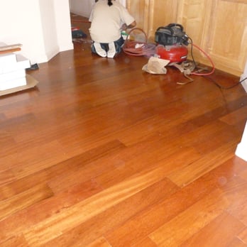 Just Floors - a hardwood floor being sanded - Flooring Near Me - Concord, California Just Floors - a hardwood floor being sanded - Flooring Near Me - Concord, California