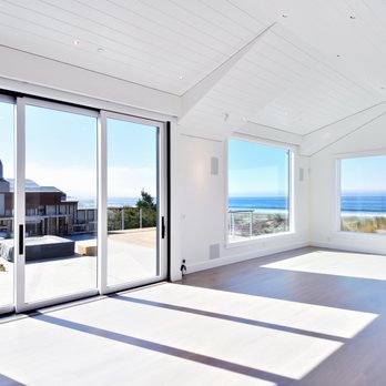 Hadley General Contractors - a spacious living room with a view of the ocean - General Contractors Near Me - Belvedere Tiburon, California Hadley General Contractors - a spacious living room with a view of the ocean - General Contractors Near Me - Belvedere Tiburon, California
