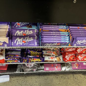 Real Produce - a shelf of milka milka chocolate bars - Grocery Near Me - San Jose, California Real Produce - a shelf of milka milka chocolate bars - Grocery Near Me - San Jose, California